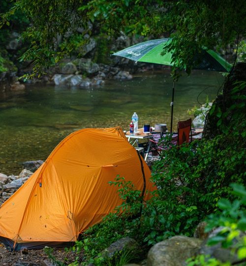 Solo camping beside river